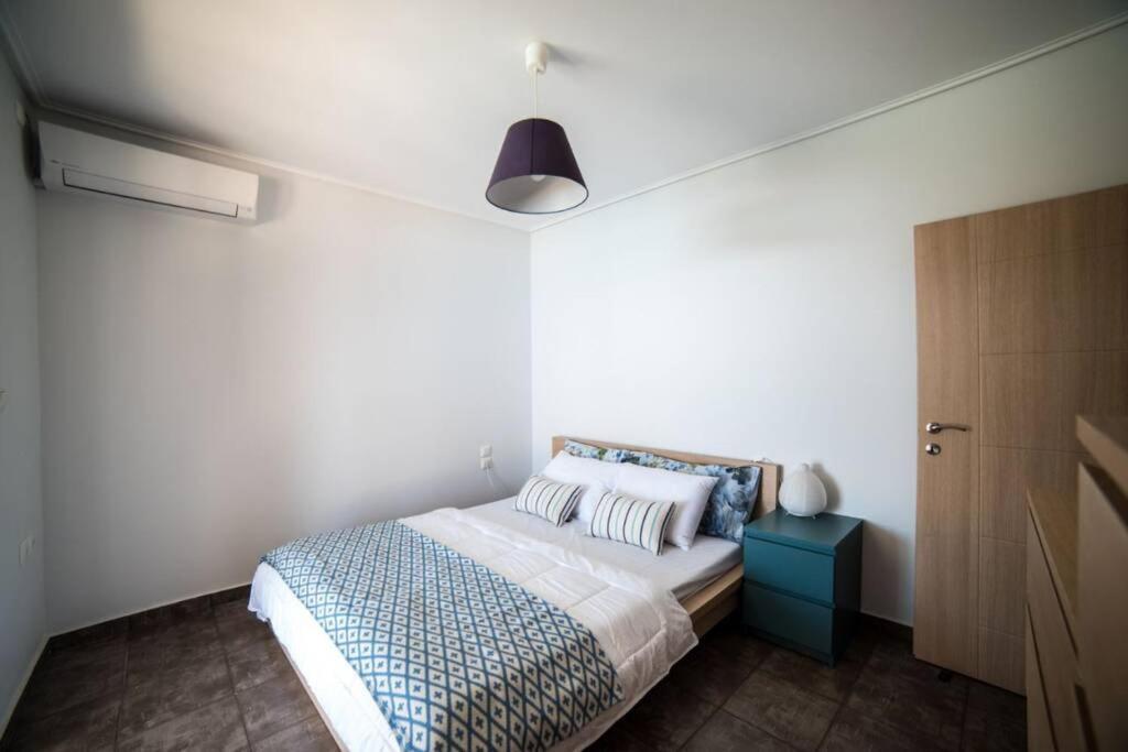 Postel nebo postele na pokoji v ubytování Apollo Romantic Sea View Villa