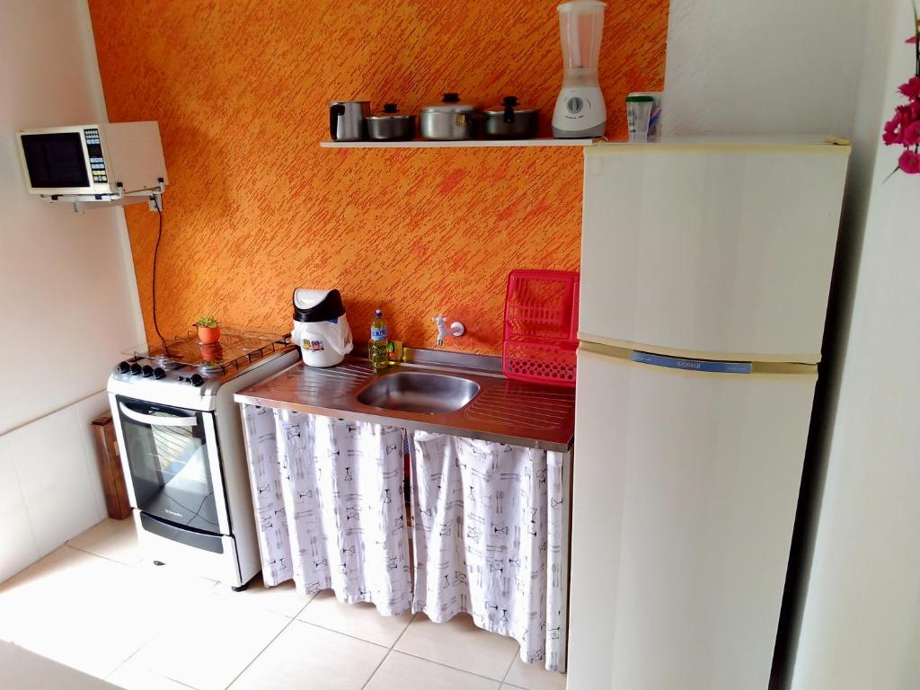 Kuchyň nebo kuchyňský kout v ubytování Férias na Barra da Lagoa