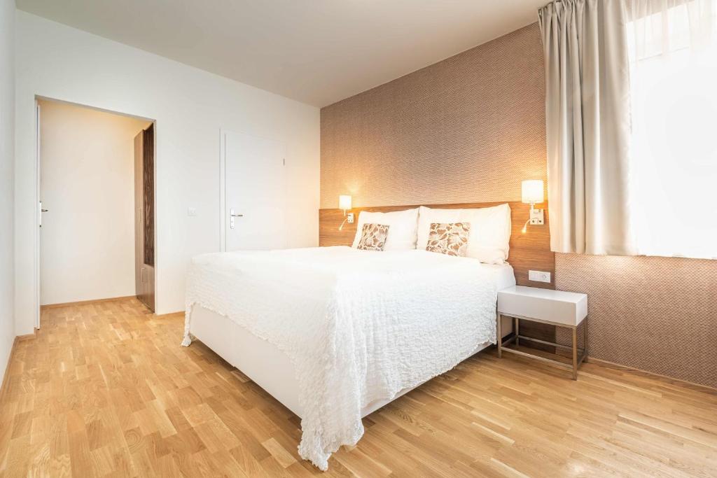 Postel nebo postele na pokoji v ubytování Vila EVA