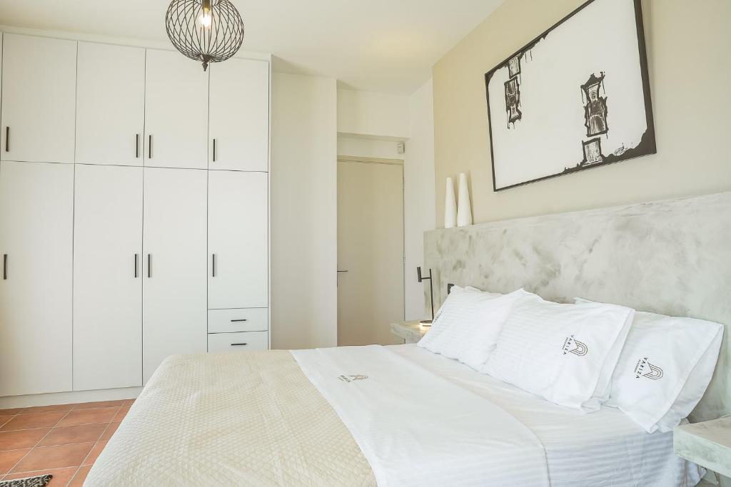 Postel nebo postele na pokoji v ubytování Variza Residence