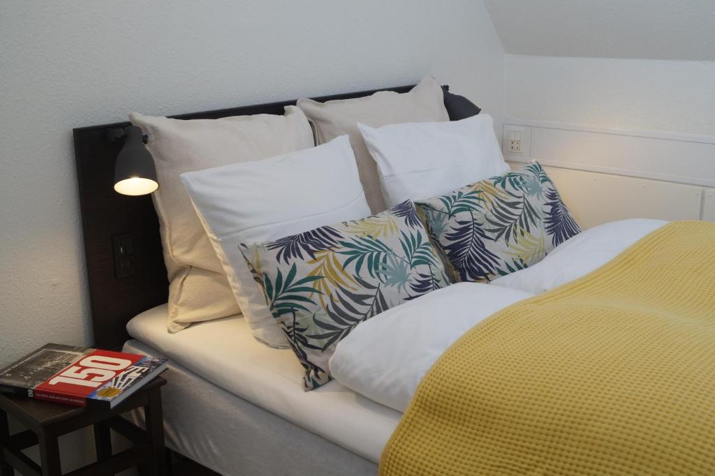 Postel nebo postele na pokoji v ubytování Skarrildhus Sinatur Hotel & Konference