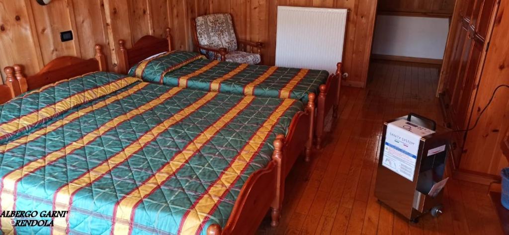 Postel nebo postele na pokoji v ubytování Albergo Rendola