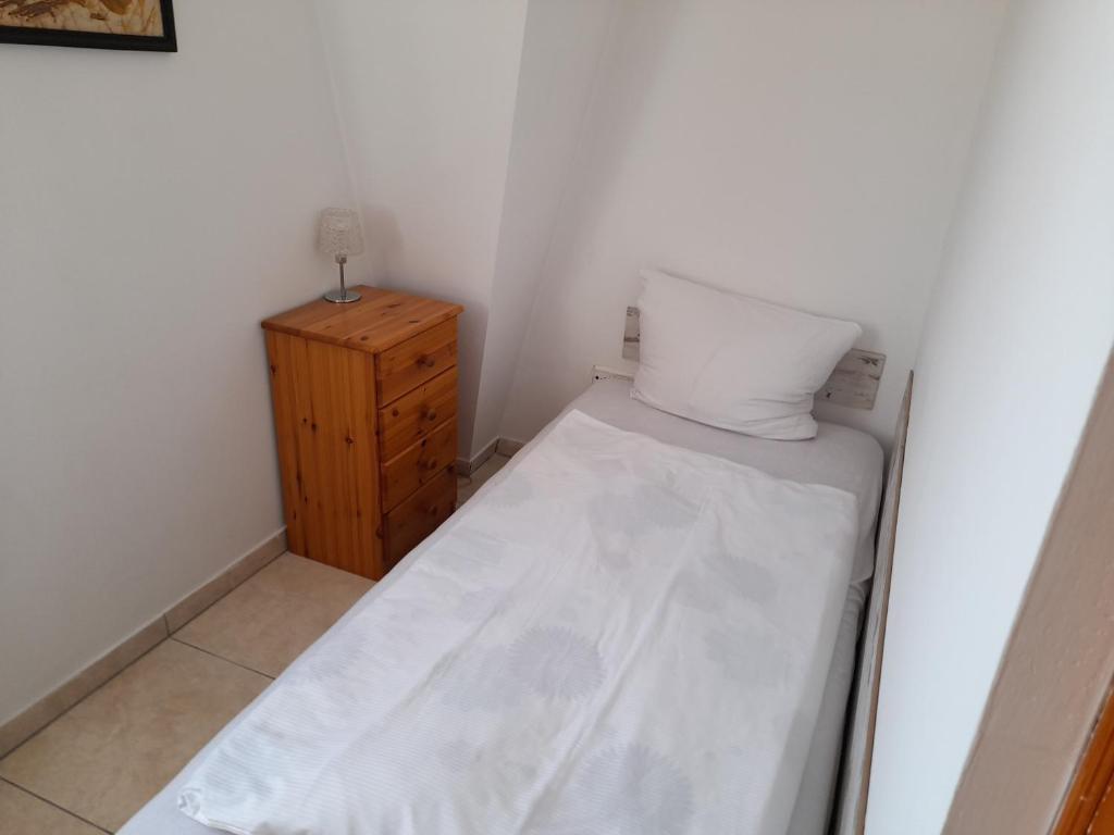 Postel nebo postele na pokoji v ubytování Guest House Móritz