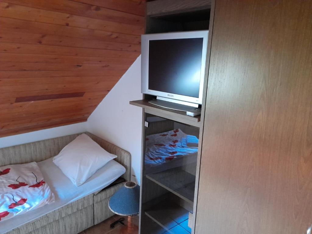 Postel nebo postele na pokoji v ubytování Guest House Móritz