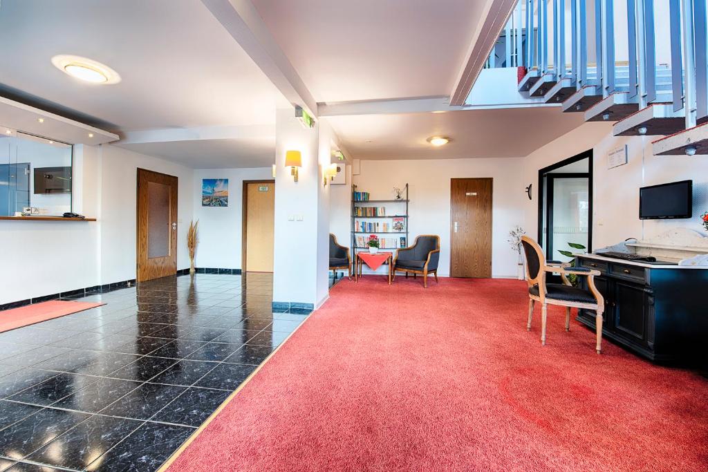 TV a/nebo společenská místnost v ubytování Hotel B1