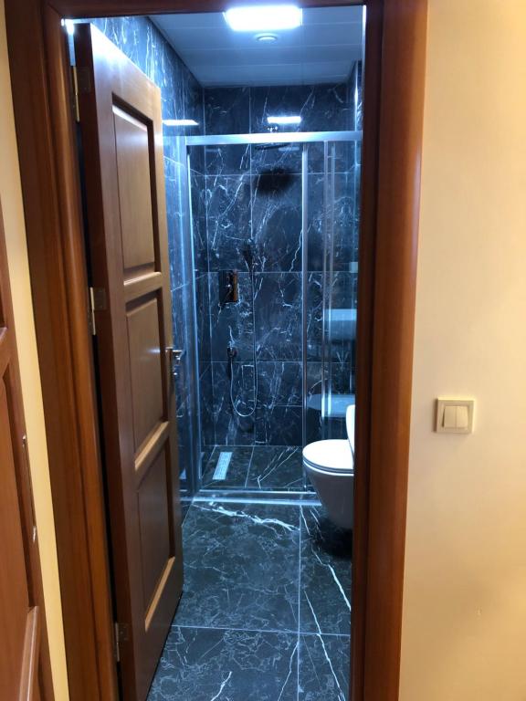 Koupelna v ubytování Pege Hotel