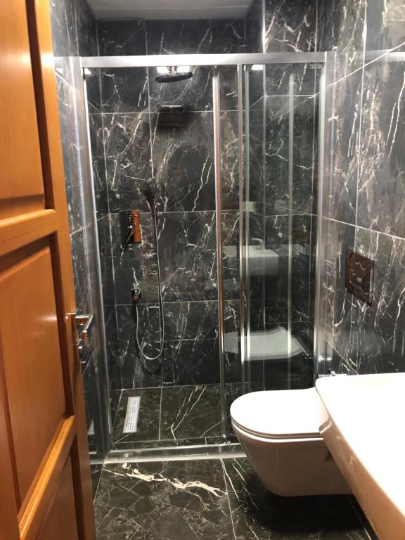 Koupelna v ubytování Pege Hotel