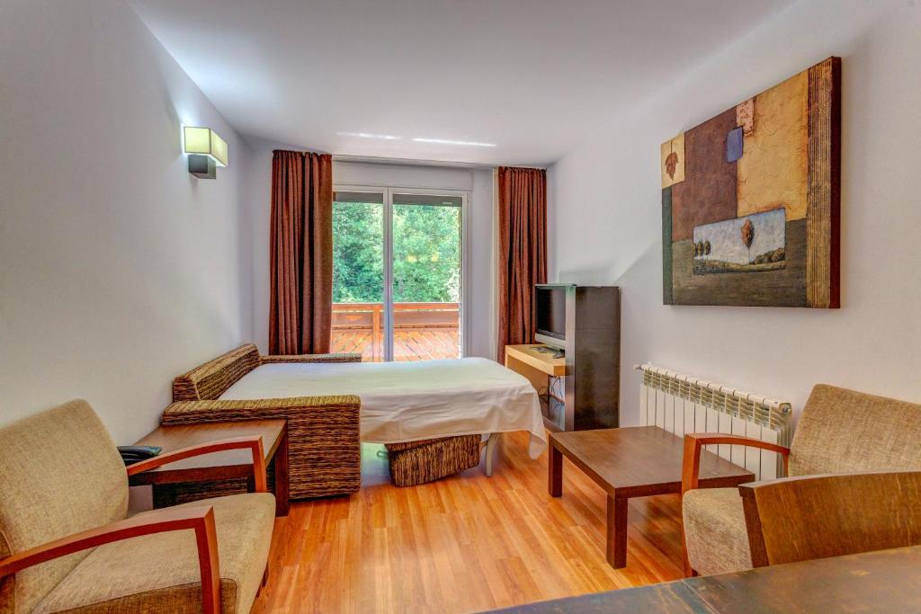 TV a/nebo společenská místnost v ubytování Apartamentos Xixerella Park Resort