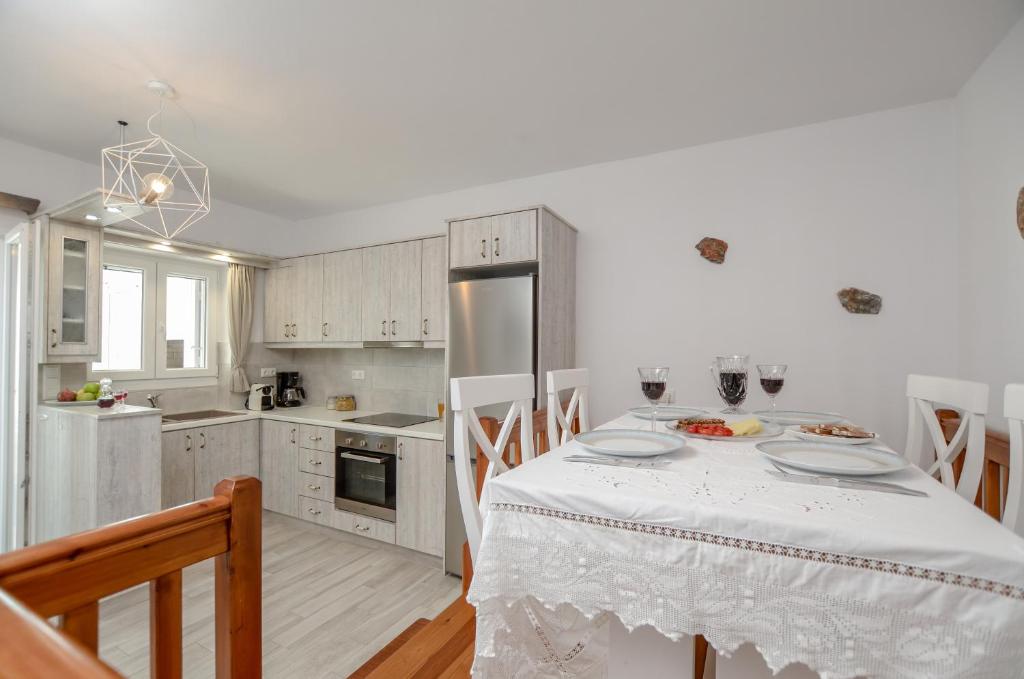 Kuchyň nebo kuchyňský kout v ubytování Naxian Wave Seaside Villa