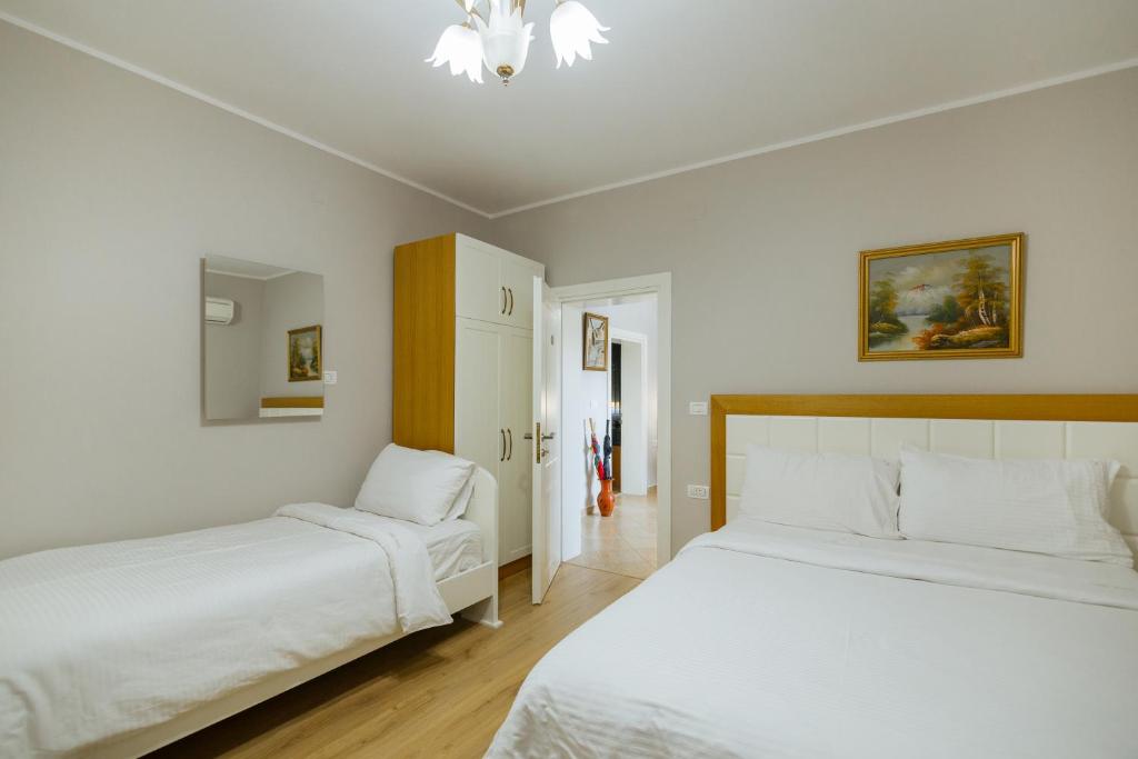 Postel nebo postele na pokoji v ubytování Vila 1