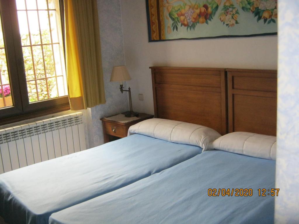 Cama o camas de una habitación en Caserón Trastamara