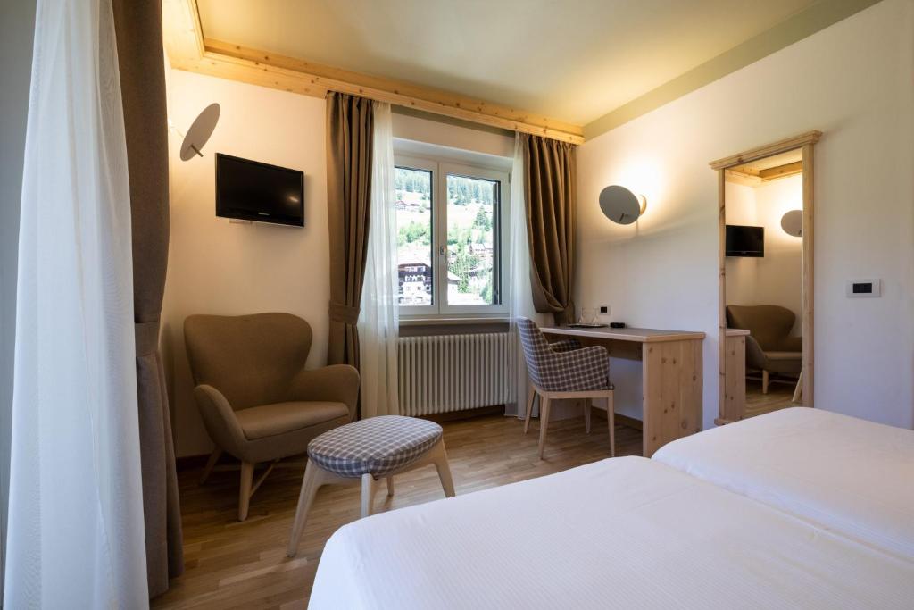 Posteľ alebo postele v izbe v ubytovaní Hotel Medil