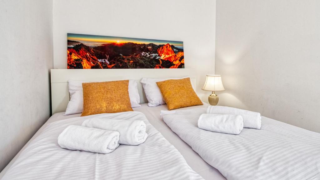 Posteľ alebo postele v izbe v ubytovaní Apartament Triventi 48 Premium - 5D Apartamenty