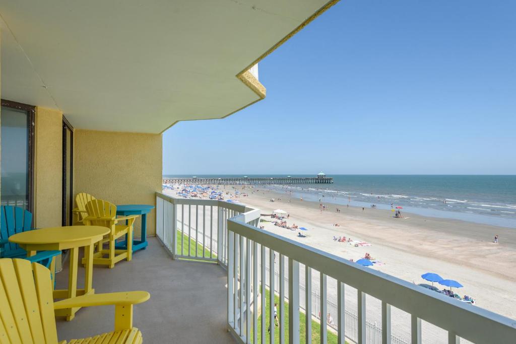 a balcony with a view of the beach at 320 COV - Relaxing Oceanfront Villa - Unbeatable Views in Folly Beach