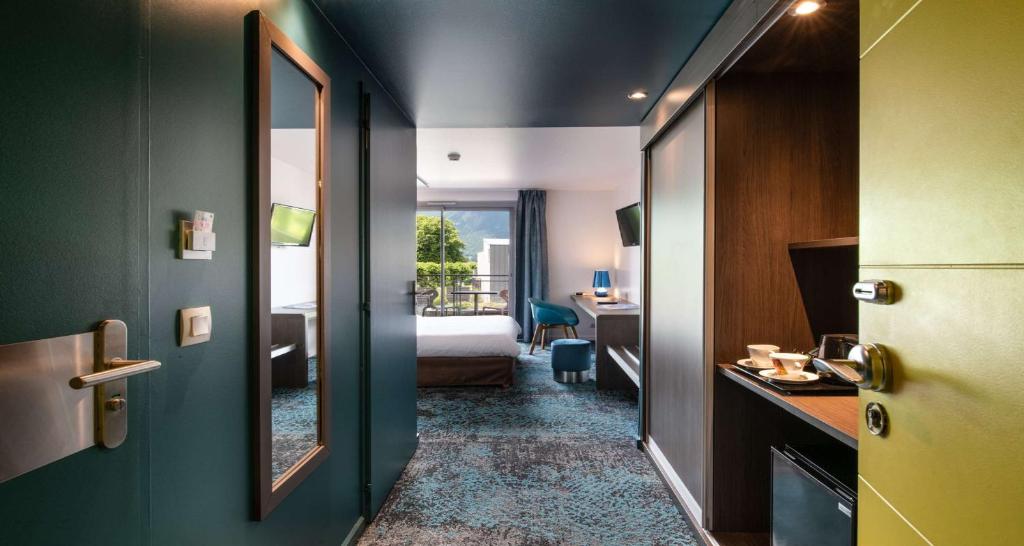 Postel nebo postele na pokoji v ubytování Best Western Aquakub