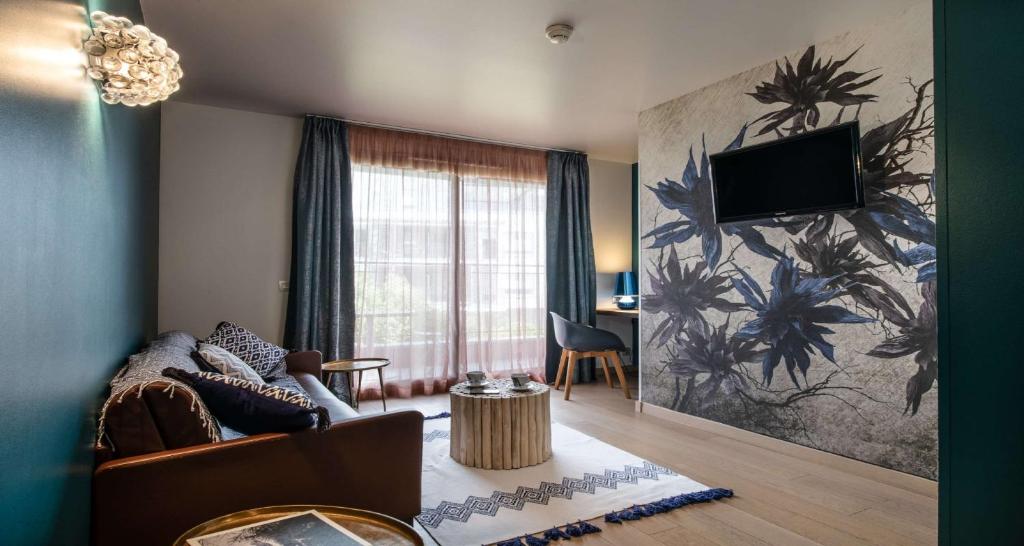 TV a/nebo společenská místnost v ubytování Best Western Aquakub