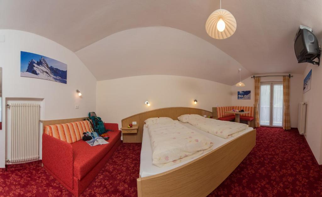 Postel nebo postele na pokoji v ubytování Kedul Lodge