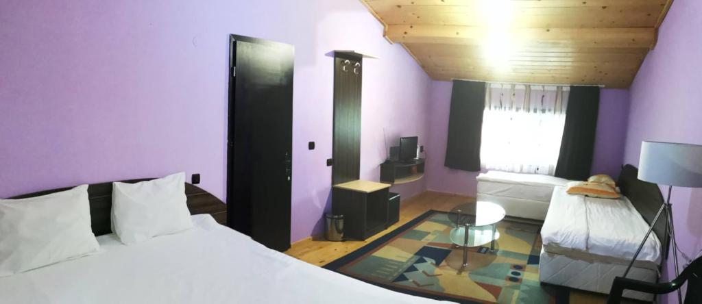Postel nebo postele na pokoji v ubytování Apartments Black Horse