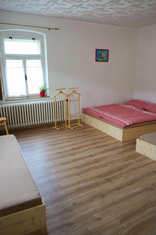 Postel nebo postele na pokoji v ubytování U Broučků