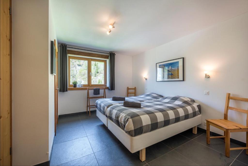 Postel nebo postele na pokoji v ubytování Ski and bike - holiday home Verbier Valley