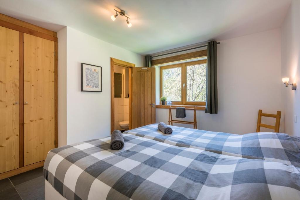 Postel nebo postele na pokoji v ubytování Ski and bike - holiday home Verbier Valley