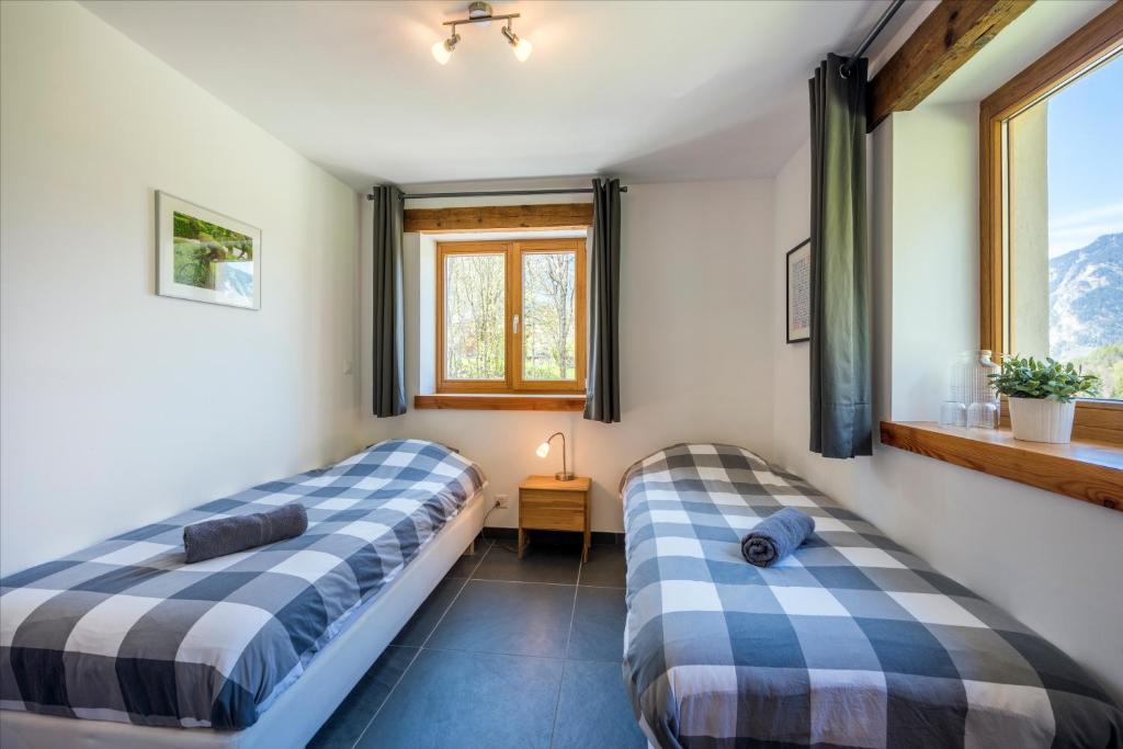 Postel nebo postele na pokoji v ubytování Ski and bike - holiday home Verbier Valley