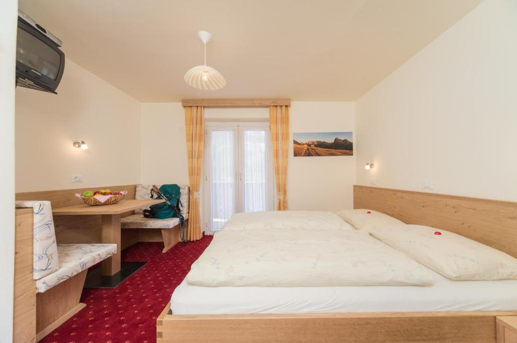 Postel nebo postele na pokoji v ubytování Kedul Lodge