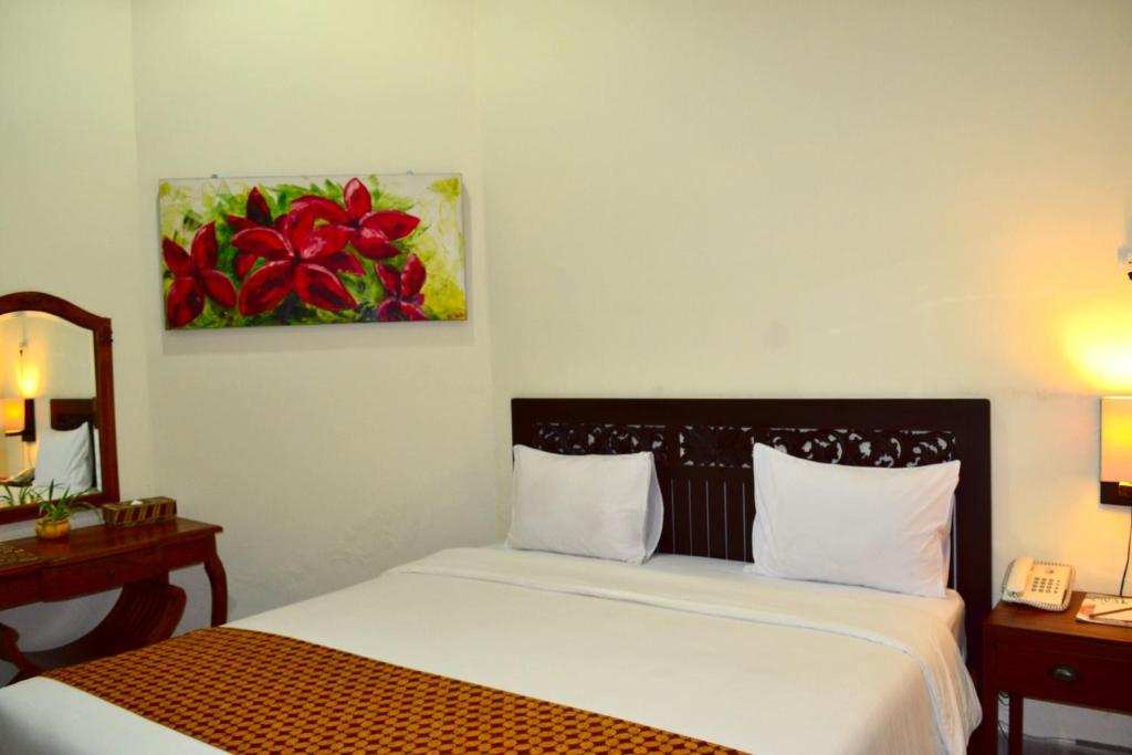 Krevet ili kreveti u jedinici u okviru objekta The Kresna Hotel