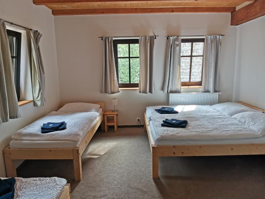 Postel nebo postele na pokoji v ubytování Chata Bramberk