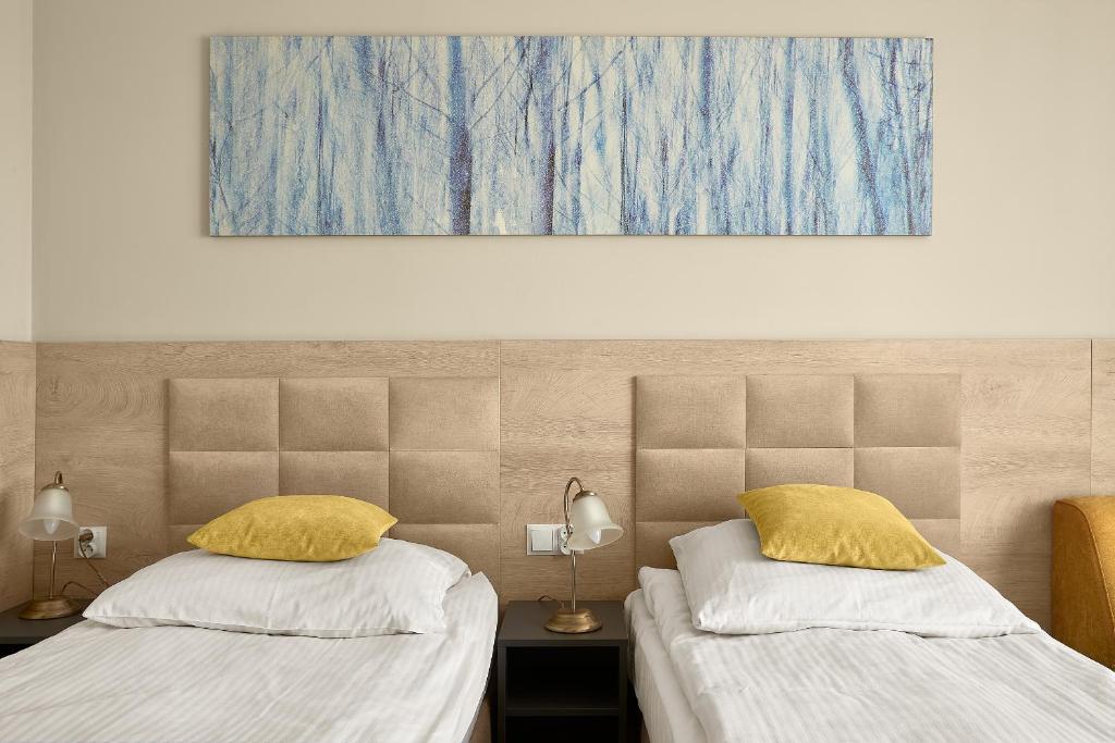 Postel nebo postele na pokoji v ubytování Sanatorium Zefir