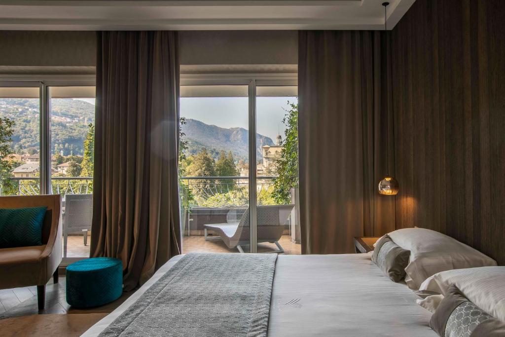 Postel nebo postele na pokoji v ubytování Hotel La Palma