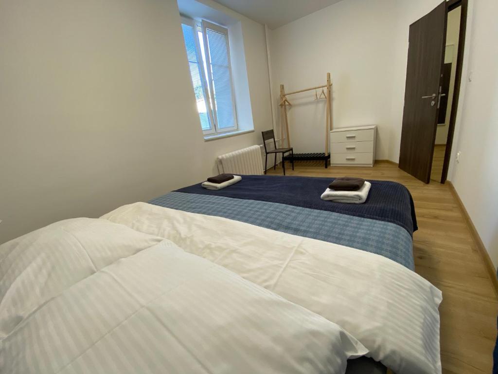 Postel nebo postele na pokoji v ubytování No. 34
