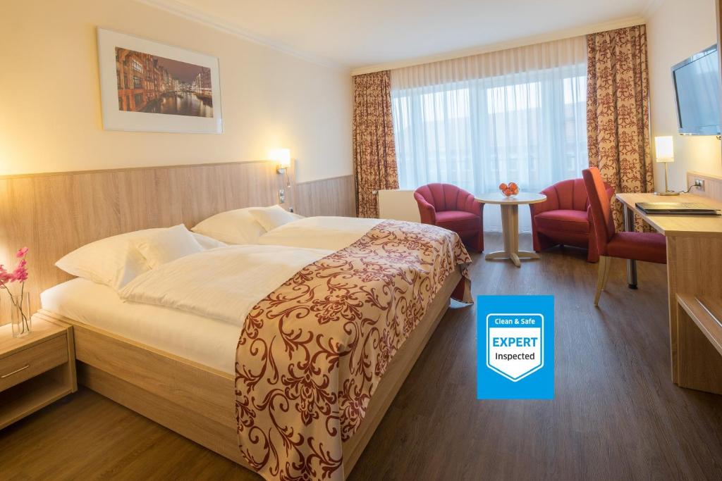 Postel nebo postele na pokoji v ubytování Apartment-Hotel Hamburg Mitte