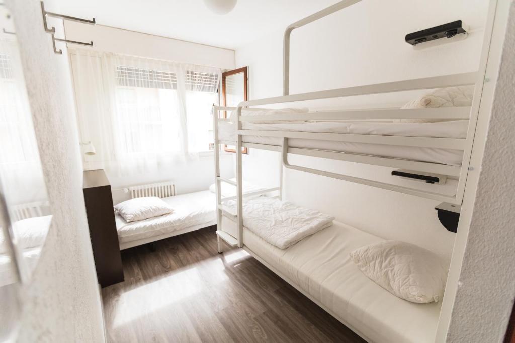 Postel nebo postele na pokoji v ubytování City Hostel Geneva