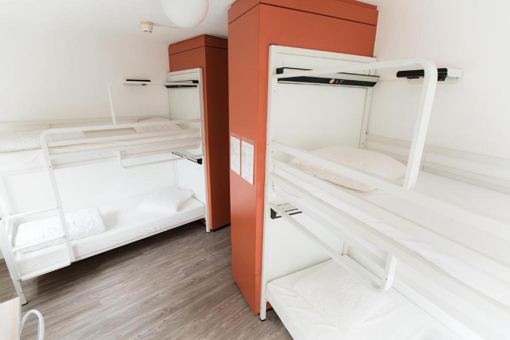 Postel nebo postele na pokoji v ubytování City Hostel Geneva