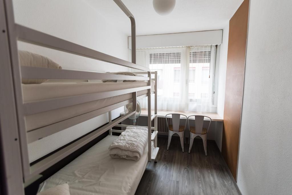 Postel nebo postele na pokoji v ubytování City Hostel Geneva