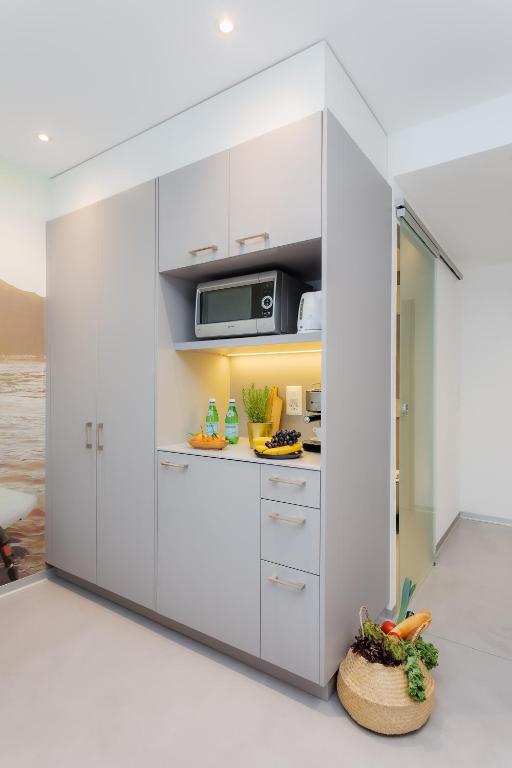 A cozinha ou kitchenette de VISIONAPARTMENTS Vevey - contactless check-in