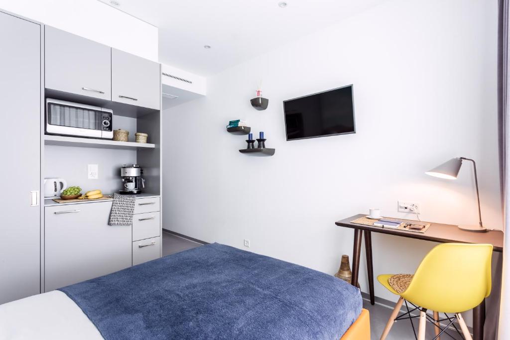 A cozinha ou kitchenette de VISIONAPARTMENTS Vevey - contactless check-in