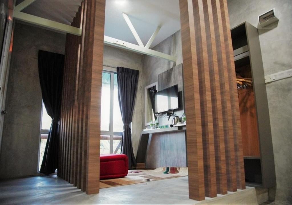 TV a/nebo společenská místnost v ubytování Rick Resort Teluk Intan