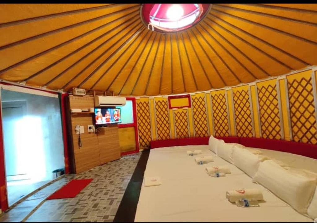 TV a/nebo společenská místnost v ubytování Rick Resort Teluk Intan