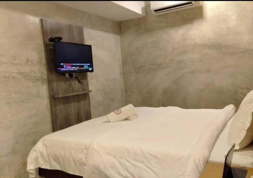 Rick Resort Teluk Intan - Deluxe Zimmer Mit Kingsize-Bett Ohne Fenster