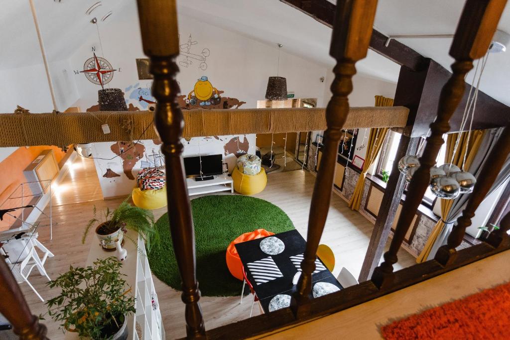 an overhead view of a living room with a table at Smile Hostel in Nizhny Novgorod