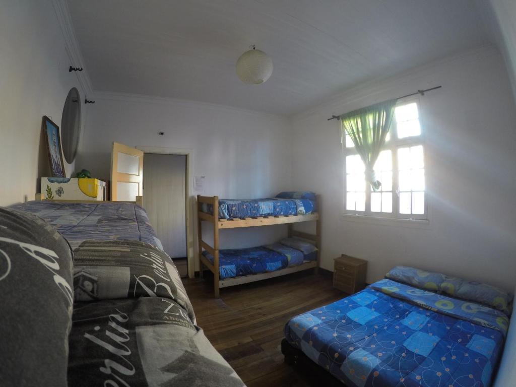 Postel nebo postele na pokoji v ubytování Lemuria Hostel