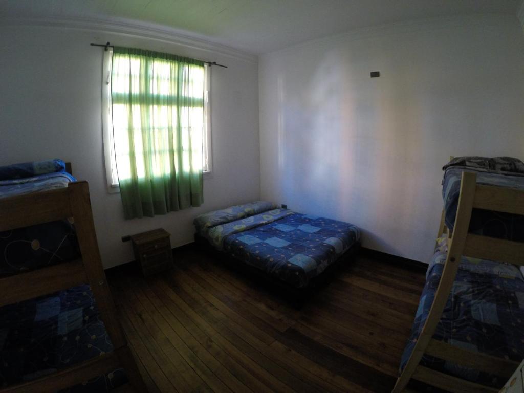 Postel nebo postele na pokoji v ubytování Lemuria Hostel