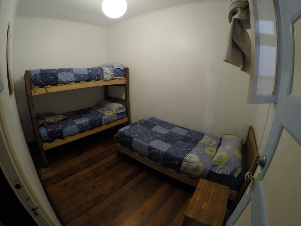 Postel nebo postele na pokoji v ubytování Lemuria Hostel