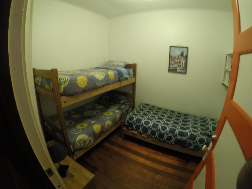 Postel nebo postele na pokoji v ubytování Lemuria Hostel
