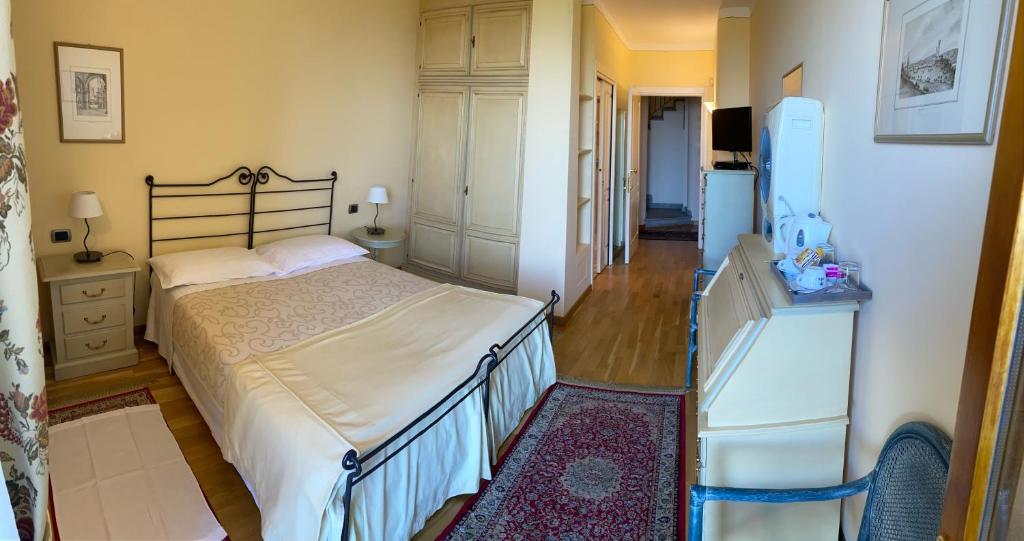 Postel nebo postele na pokoji v ubytování LA SISMONDA
