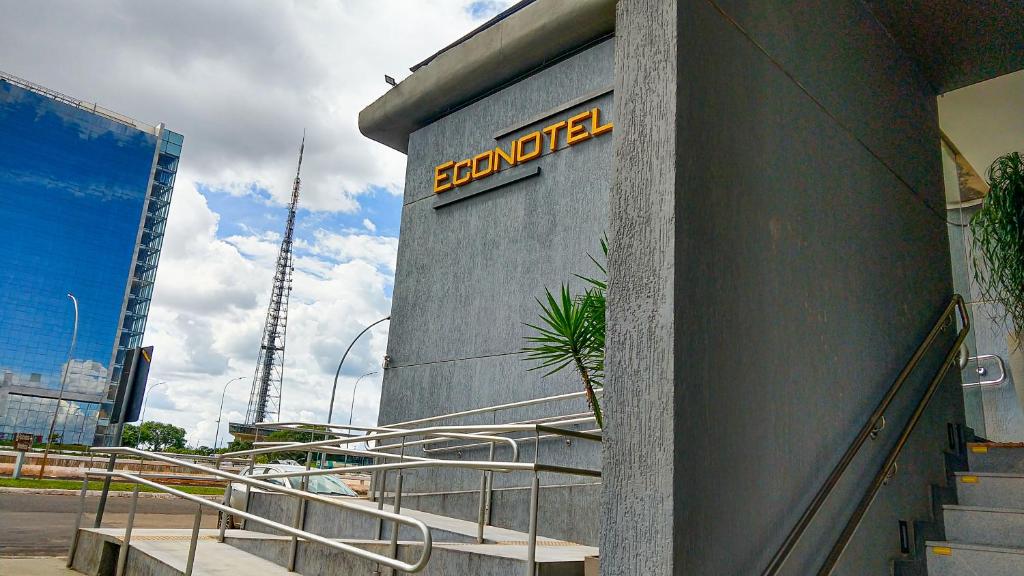 a building with a sign on the side of it at Hotel Econotel in Brasilia