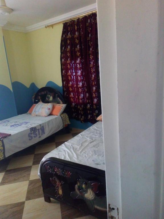Postel nebo postele na pokoji v ubytování IKEA Flats