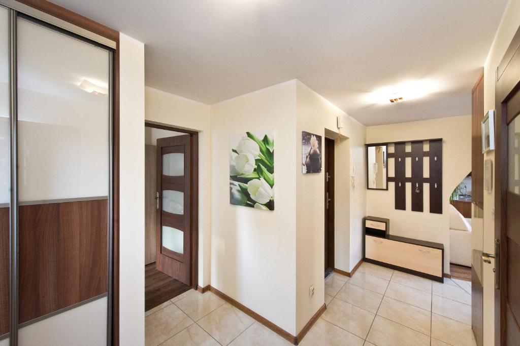 Posteľ alebo postele v izbe v ubytovaní Gdańskie Apartamenty - Apartamenty na Świetego Ducha z 2 sypialniami